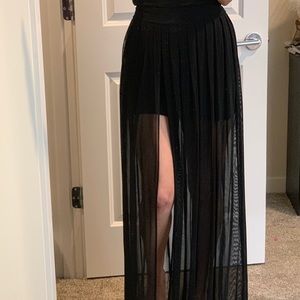 Black mini skirt with sheer black overlay